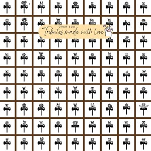 May include: A grid of black dog-themed cake toppers, each featuring a different breed and a bone-shaped base. The toppers have a sign with a name. The image includes the text "Over 500 Tributes made with Love" and a paw print.