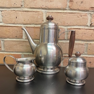 Oneida Tea or Coffee Serving Set Includes Pot with Lid, Creamer and Sugar Bowl with Lid Stainless 18/8 Vintage 60&#39;s Stainless w/ Wood Trim