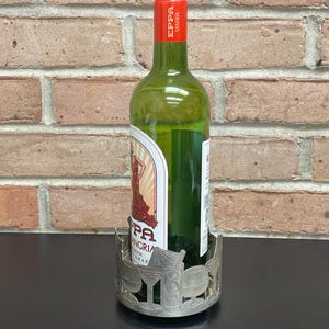 Vintage Silver Plate Bottle Coaster with Cocktail Glasses Cut out of the Metal All Around Raised on Three Bun Feet Holds Wine or Liquor