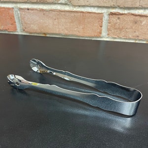 VTG szczypce posrebrzane, metalowe szczypce do lodu, owoców, ciasta lub cukru, w kolorze srebrnym. Pięknie zaprojektowane szczypce do szczypiec, oznakowane U.S.A.
