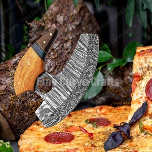 Pizza Cutter knife is ideal for gift or home use.
Our pizza knives aremade by hand. Each Viking knife is made of knife 
steel with wooden handle and is perfect as a medieval or Viking decoration.