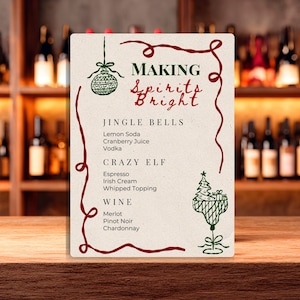 May include: A festive menu card with the words "MAKING Spirits Bright" in red script. The card lists cocktail recipes like "Jingle Bells" and "Crazy Elf", and wine options. Decorative green Christmas ornaments and a wine glass are featured.