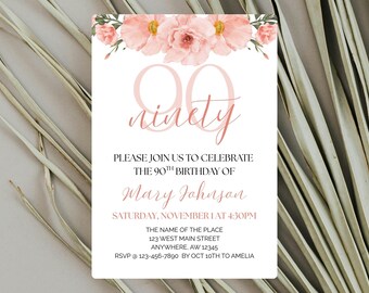 May include: A white invitation card with a floral design at the top and the number "90" in a soft pink color. The text reads "ninety" and invites guests to celebrate Mary Johnson's 90th birthday on November 1st.