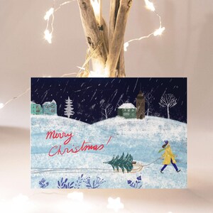 Carte postale Femme avec traîneau I Neige de Noël I Carte de Noël durable I Illustration I Art I Joyeux Noël I Arbre de Noël