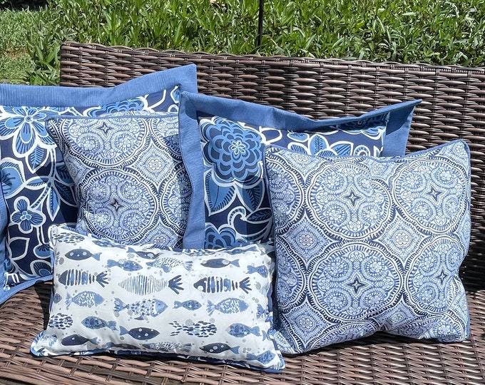 Decorative outdoor, handmade, slipcover style pillow covers in a variety of beautiful blue fabrics