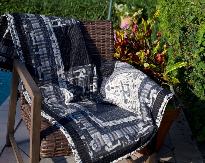 Black, gray and cream quilt