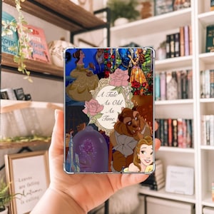May include: A clear phone case with a design from the film "Beauty and the Beast." The case features Belle, the Beast, and the text "A Tale As Old As Time" within a floral frame, in a collage of images.
