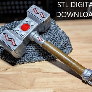 May include: A silver and red 3D printed warhammer with a brown wooden handle. The hammer is resting on a chainmail background. STL DIGITAL DOWNLOAD.