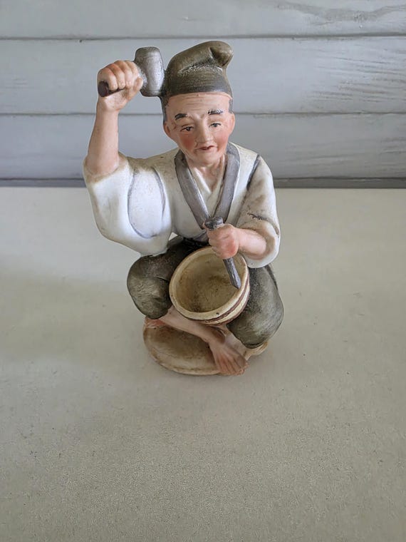 Vintage Porcelain Asian Man Figurine Holding Hammer and Chisel