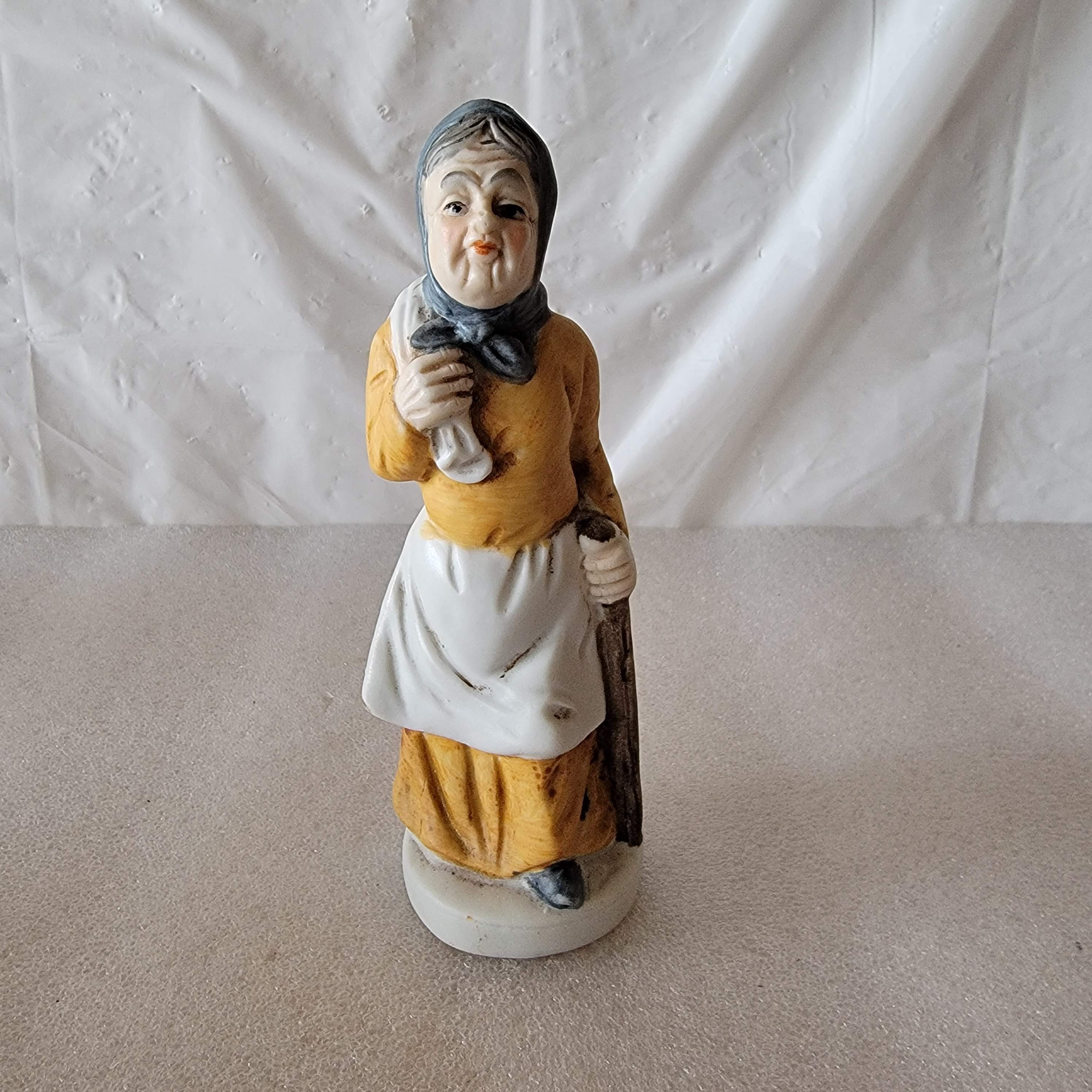 Vintage Porcelain Elderly Woman Figurine Wearing Apron With A