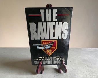 Les corbeaux de Christopher Robbins Les hommes qui volèrent pendant la guerre secrète de l'Amérique au Laos 1987 Première édition relié avec jaquette