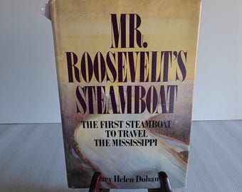 El barco de vapor del Sr. Roosevelt, de Mary Helen Doham, 1987. Tapa dura con sobrecubierta. Edición del club de lectura.