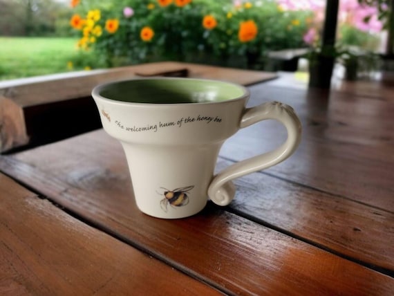 Christian Parable Flower Pot Bee Coffee Mug Mary Lak-Thompson Ceramic The Welcoming Hum of The Honey Bee Off White/Beige Green Interior