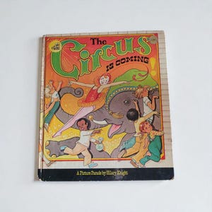 El circo se acerca. Un desfile de imágenes de Hilary Knight, 1976. Un libro dorado. Libro infantil. Tapa dura. Vintage. Coleccionable. Único.