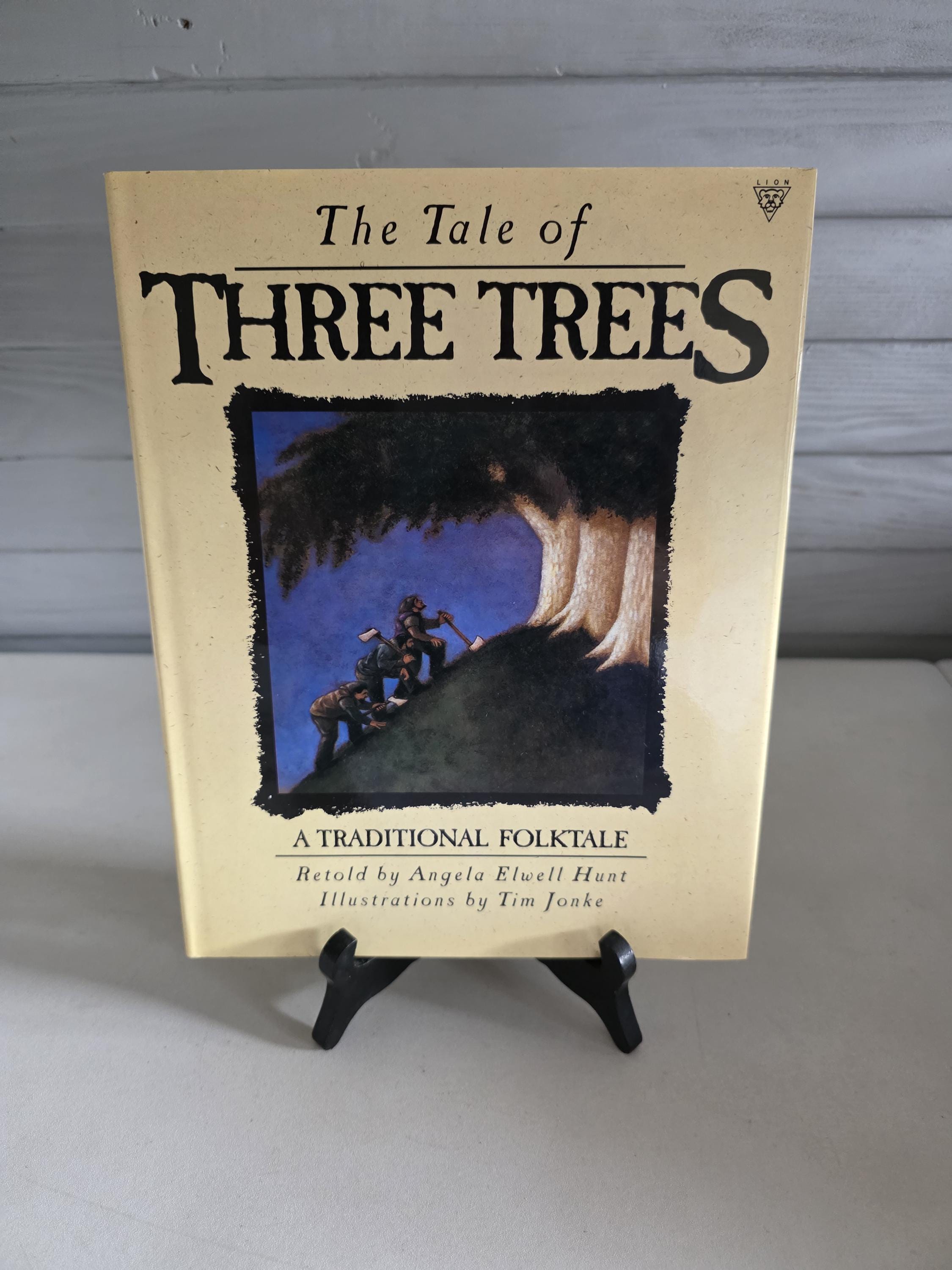 The Tale of Three Trees A Traditional Folktale Retold by Angela