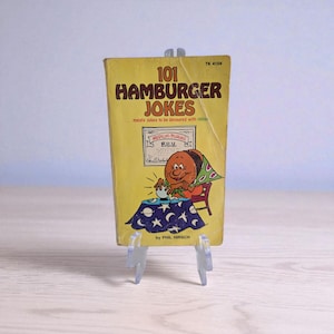 101 Hamburger Jokes Meaty Jokes To Be Devoured With Relish by Phil Hirsch 1978 Scholastic Book Services Paperback Vintage Book Unique