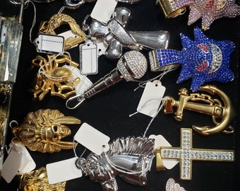 Assorted Stainless Steel Pendants. Unisex Pendants. Silver Pendants. Gold Pendants. Stylish Stainless Steel Pendants.