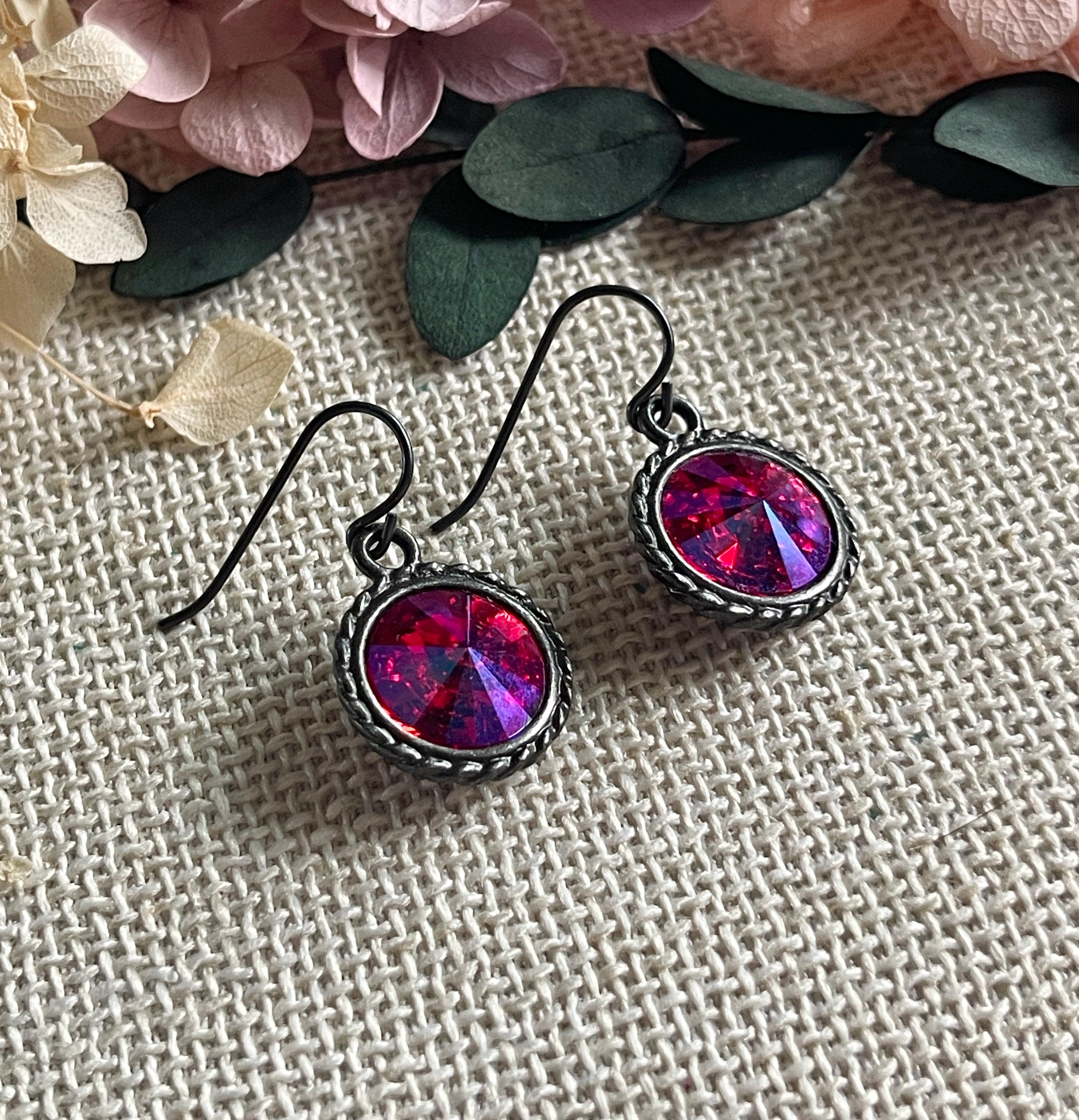 Handmade gunmetal circle earrings with pink glass rhinestones, TierraCast hypoallergenic Niobium ear hooks.