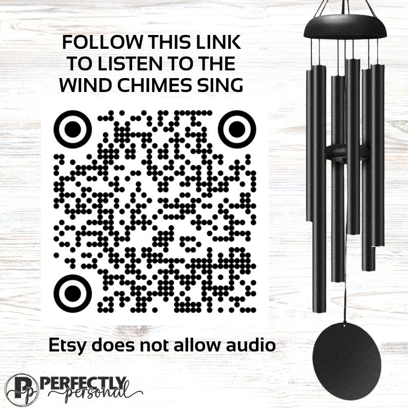 May include: Black wind chimes with a round top and multiple cylindrical tubes hanging below. The image includes a QR code and text that reads "FOLLOW THIS LINK TO LISTEN TO THE WIND CHIMES SING" and "Etsy does not allow audio."