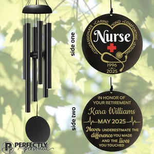 May include: Black wind chimes with a round pendant featuring the word "Nurse" and a stethoscope graphic. The second pendant reads "In Honor of Your Retirement" with a name and date. The chimes are a thoughtful gift.