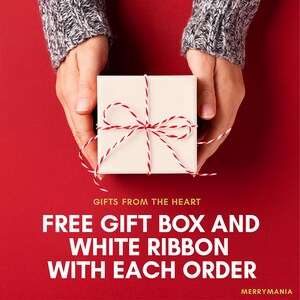 May include: A square white gift box tied with a red and white baker's twine ribbon. The text on the image reads: GIFTS FROM THE HEART, FREE GIFT BOX AND WHITE RIBBON WITH EACH ORDER, MERRYMANIA. The background is a solid, vibrant red color.