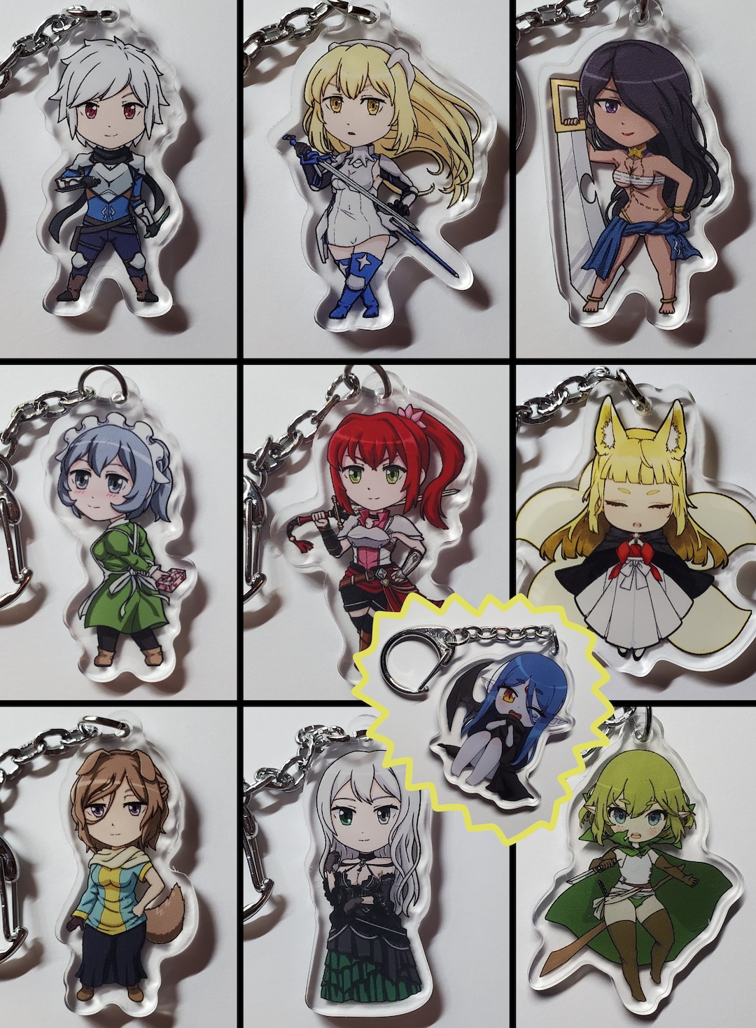 ダンまち　アクリルキーホルダー 2個買うと1個無料！ダンまちキーホルダー（ベル、アイズ、アイシャ