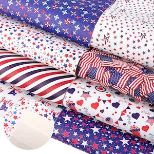 May include: A stack of six different patterned fabric sheets featuring red, white and blue colours. The patterns include stars, stripes and American flags. The fabric sheets are perfect for crafting projects, scrapbooking and home decor.