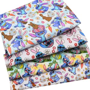 May include: A white ceramic mug with a black handle and the text "But First, Coffee" in a bold, black font. The mug is set against a blurred background, suggesting a cosy setting.