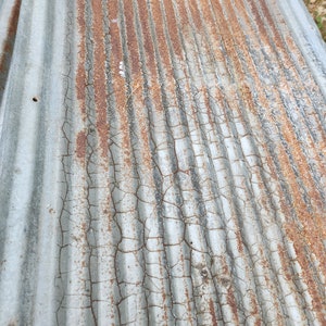 Rusty corrugated barn tin reclaimed metal wall panel salvaged metal bar vintage patina man cave decor she shed barn tin wall panels basement