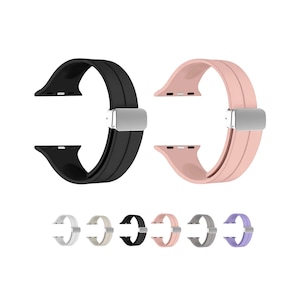 May include: Two silicone watch bands for Apple Watch, one black and one pink. The bands have a silver buckle and are shown with other color options: silver, beige, black, pink, gray, and purple.