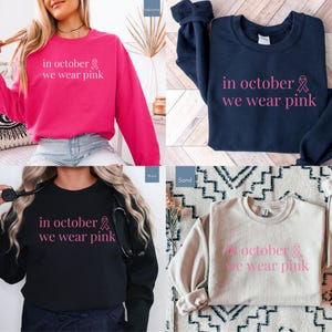 In October We Wear Pink in a simple lettering. This Halloween Tee is perfect for healthcare heroes or anyone supporting Breast Cancer Awareness during spooky season. A thoughtful and festive Oncology Nurse Tee or Cute Nurse Tshirt for October events, hospital shifts, or awareness walks. Celebrate with this Pink Ribbon Shirt designed for nurses or medical assistants who care.
