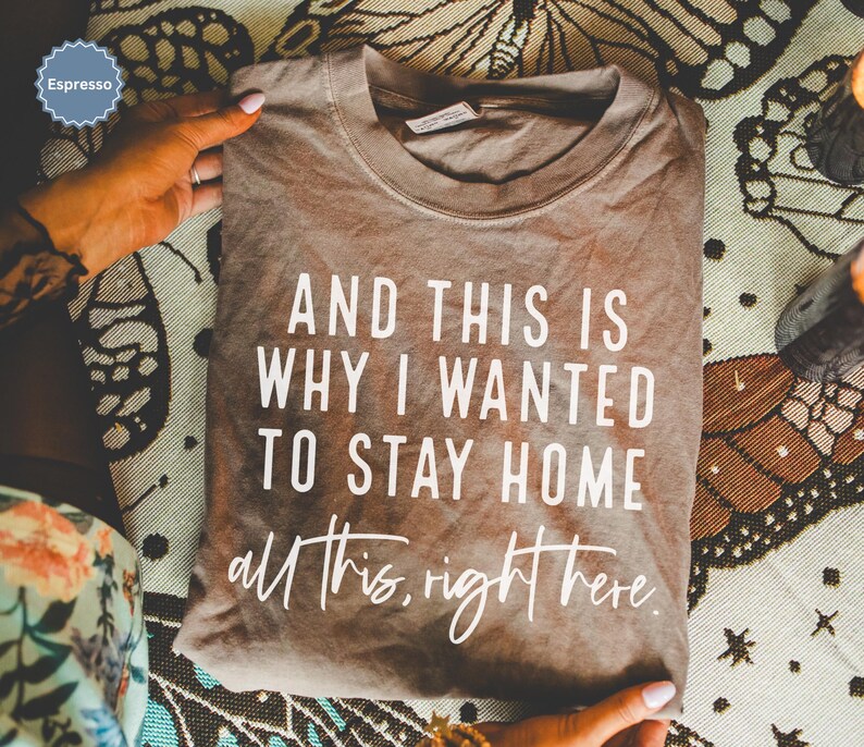 Relatable and hilarious funny shirt that says “And This Is Why I Wanted To Stay Home – All This, Right Here,” this meme shirt is perfect for introverts, socially drained moms, funny gifts or a sarcastic shirt. Whether you're a tired parent or just over the drama, this funny mom shirt with a Funny Quote says it all. A trendy and comfy shirt for women, this Humor Shirt is a must-have for lovers of funny humor shirt vibes and effortlessly cool womens tshirts.
