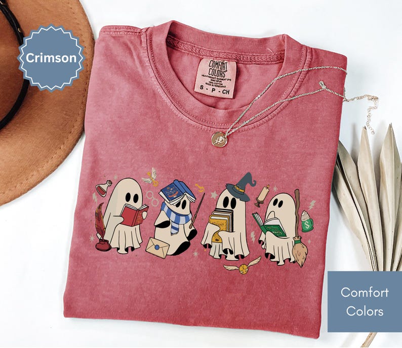 Halloween shirt featuring a cute reading ghosts dressed as wizard houses, perfect for spooky season. This wizard shirt doubles as a fun wizarding school tee or Halloween tee, ideal for Halloween matching, family trips, or Halloween group outfits with a magical twist.