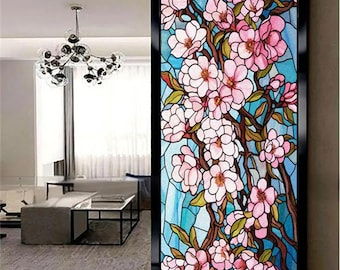 May include: A stained glass window film featuring a floral design with pink and white flowers on a blue background.