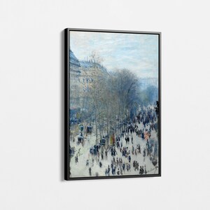 Pode incluir: Uma pintura que retrata uma cena de rua parisiense movimentada com pessoas caminhando e carruagens puxadas por cavalos. Os edifícios estão no fundo e o céu é azul claro. A pintura está em uma moldura preta.