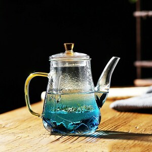 Teabloom Princess of Monaco Teapot Blooming Tea Gift Set 6 Pieces - 34 oz Borosilicate Glass Teapot Porcelain Lid Teapot Warmer Porcelain Tea