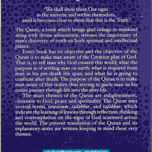 May include: The back cover of a book titled "The Quran" with a purple background and white text. The book is published by Goodword Books and includes the ISBN number 978-93-86589-10-1. The text on the back cover describes the Quran as a book that brings glad tidings to mankind and stresses the importance of man's discovery of truth on both spiritual and intellectual planes.