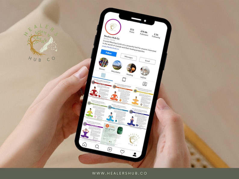 May include: A smartphone displays an Instagram profile for Healers Hub Co, showcasing Crystal Meaning Cards. The screen features colorful graphics of people in yoga poses, with text describing crystal properties. The profile logo includes a tree and a dove.