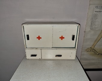 Vintage wooden apothecary cabinet; First aid kit
