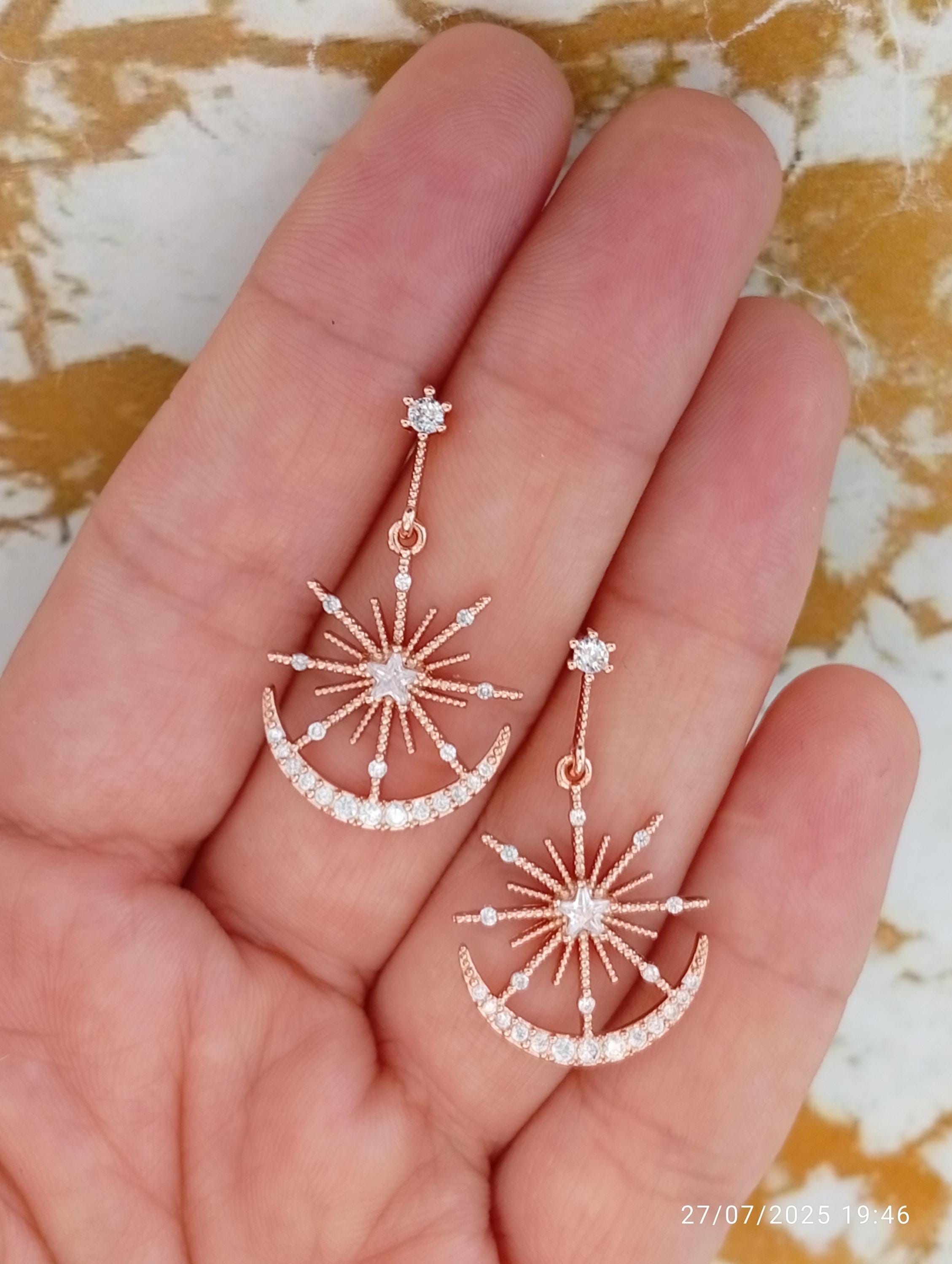 スワロフスキー symbolic ピアス 星 月 ドロップ SWAROVSKI 公式
