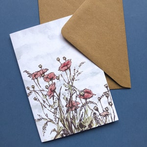 May include: A watercolor illustration of a bouquet of red poppies with green stems and leaves on a white background.