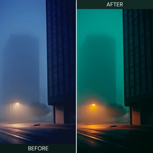 May include: A foggy city street at night with a tall building on the right and a streetlight illuminating the road. The sky is a dark blue and the fog is a light blue. The building is dark grey and has many windows. The streetlight is a bright yellow.