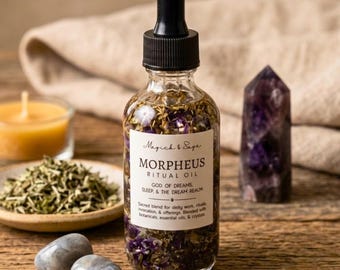 May include: A clear glass dropper bottle filled with ritual oil containing dried herbs and small purple crystals. The white label reads Magick & Sage MORPHEUS RITUAL OIL GOD OF DREAMS SLEEP & THE DREAM REALM. A black dropper cap sits on top.