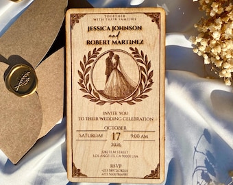 May include: A wooden wedding invitation with a laser-cut design. The invitation features a couple in a vintage style, a laurel wreath, and the text "Together with their families Jessica Johnson and Robert Martinez Invite you to their wedding celebration Saturday October 17 9:00 AM 2026 1282 Elm Street Los Angeles, CA 90001 USA RSVP +233 589726782115 +233 56007866981".