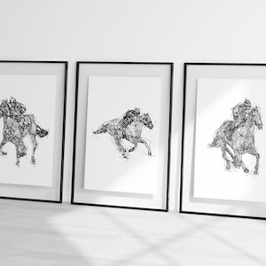 May include: Three framed art prints featuring black and white line drawings of racehorses with jockeys. The artwork depicts the horses in motion, with a focus on the dynamic energy of the sport. The frames are black.