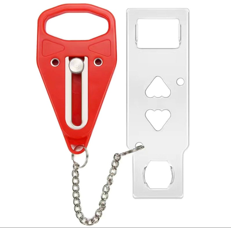 May include: A red door lock with a handle and a white sliding mechanism. A silver chain connects the red lock to a clear, rectangular plate with cut-out shapes. This security device is designed to prevent unwanted entry.