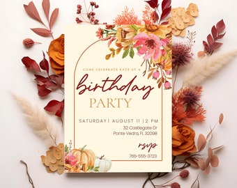 May include: A cream-colored invitation with a floral design in shades of orange, yellow, and pink. The text reads "Come celebrate Kate at a Birthday Party" with the date and time "Saturday August 11 | 2 PM" and the address "32 Castlegate Dr Ponte Vedra, FL 32098". The RSVP information is "rsvp 765-555-3723".