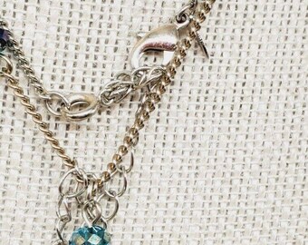 Vtg NRT Avon Goldtone Blue & Clear Stone Blue Tassel Flapper