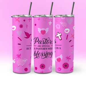 May include: Pink tumbler with a silver lid and straw. The tumbler is decorated with hearts, crosses, flowers, and the text "Pastors are special, but a pastor's wife is a blessing."