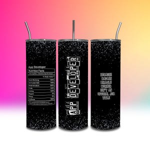May include: Three black and white tumbler cups with a glitter finish. The cups feature different designs related to the job of an app developer. The first cup has a nutrition facts label for an app developer. The second cup has the words "App Developer" written in a block style font. The third cup has the text "Because badass miracle worker isn't an official job title."